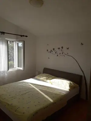 Krevet ili kreveti u jedinici u objektu Apartmani Lasić