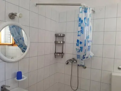 Kupaonica u objektu Grebaville Apartment