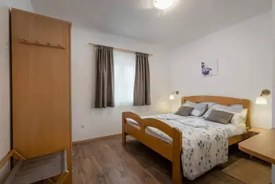 Krevet ili kreveti u jedinici u objektu Apartmani Marina