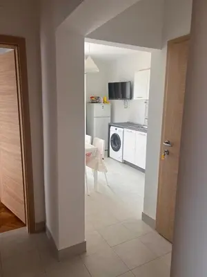 TV i/ili zabavni centar u objektu Sea Breeze Apartment