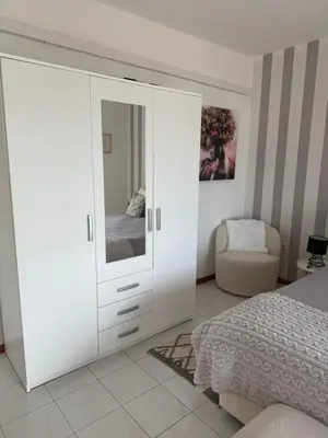 Krevet ili kreveti u jedinici u objektu Beachfront Apartments Jackie