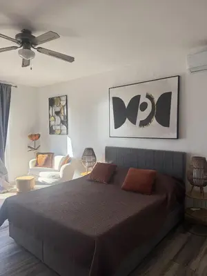 Krevet ili kreveti u jedinici u objektu Beachfront Apartments Jackie