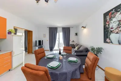 TV i/ili zabavni centar u objektu Beachfront Apartments Jackie