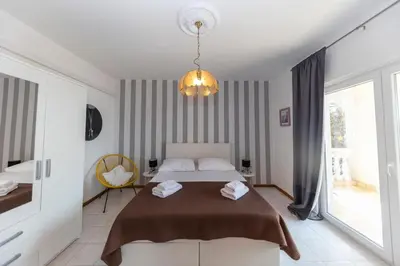 Krevet ili kreveti u jedinici u objektu Beachfront Apartments Jackie