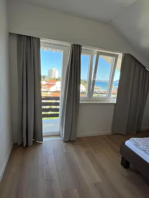 Krevet ili kreveti u jedinici u objektu Apartments and Rooms Bozena