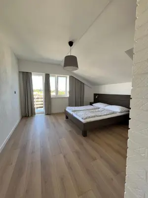 Krevet ili kreveti u jedinici u objektu Apartments and Rooms Bozena