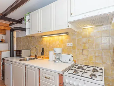 Kuhinja ili čajna kuhinja u objektu Holiday Home Okit by Interhome
