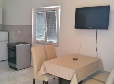 TV i/ili zabavni centar u objektu Colorful Family Apartments in Vodice