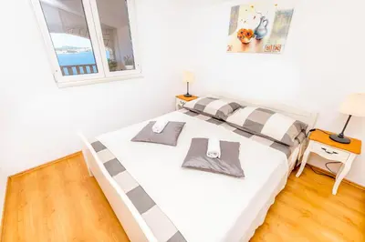 Krevet ili kreveti u jedinici u objektu Apartments Marina