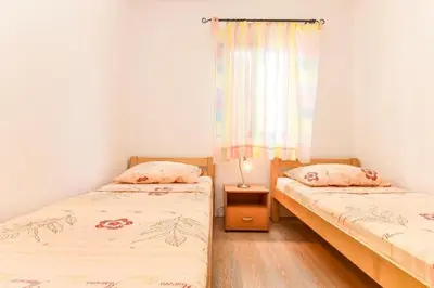Krevet ili kreveti u jedinici u objektu Apartments by the sea Zaboric, Sibenik - 22720
