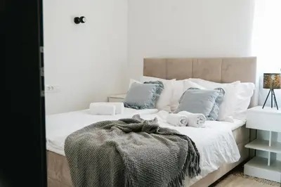 Krevet ili kreveti u jedinici u objektu Modern,Stylish Exclusive Villa with Pool&Jacuzzi