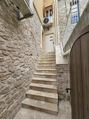 Tlocrt objekta Apartman Logorun stone house 10 m from the sea