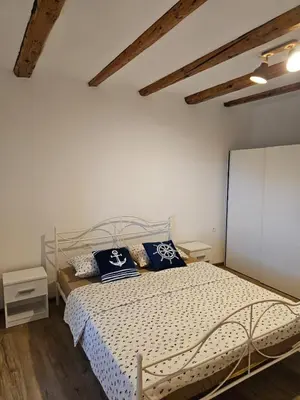 Krevet ili kreveti u jedinici u objektu Apartman Logorun stone house 10 m from the sea