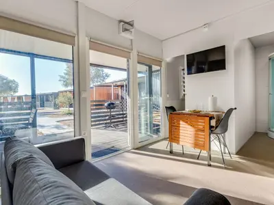 TV i/ili zabavni centar u objektu Holiday Home Delux Eco by Interhome