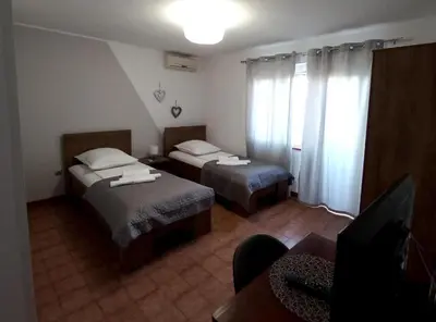 Krevet ili kreveti u jedinici u objektu Pansion Stones Murter
