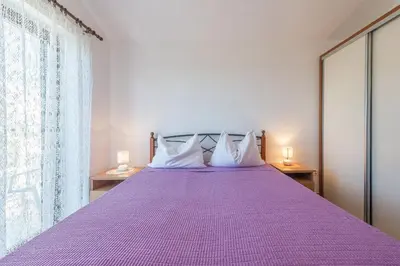 Krevet ili kreveti u jedinici u objektu Apartments Pleadin