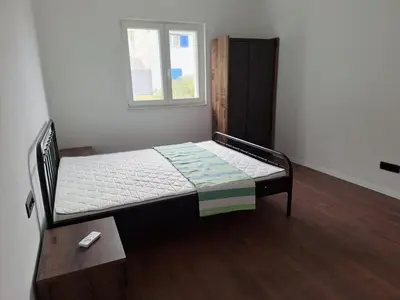 Krevet ili kreveti u jedinici u objektu Apartments by the sea Rogoznica - 23767