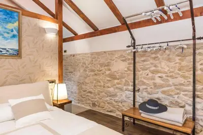 Krevet ili kreveti u jedinici u objektu Luxury Villa Finessa Skradin 2 with heated pool, jacuzzi and sauna