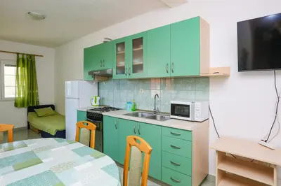 Kuhinja ili čajna kuhinja u objektu Apartments by the sea Sparadici, Sibenik - 23939