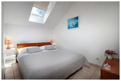 Krevet ili kreveti u jedinici u objektu Apartments Jerko