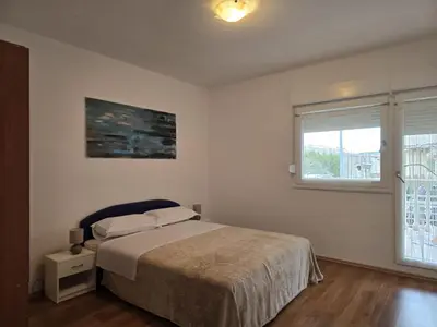 Krevet ili kreveti u jedinici u objektu Apartmani Dino