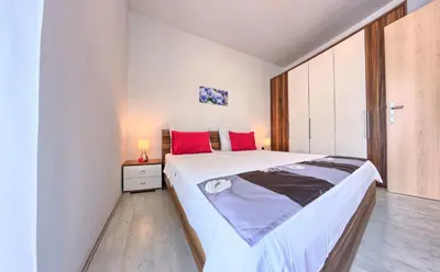 Krevet ili kreveti u jedinici u objektu Apartments CVITA Holiday