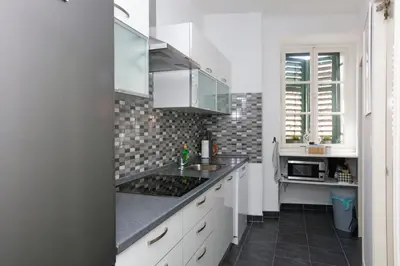 Kuhinja ili čajna kuhinja u objektu Apartments by the sea Sibenik - 23784