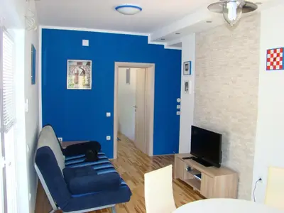 TV i/ili zabavni centar u objektu Apartments Pinus