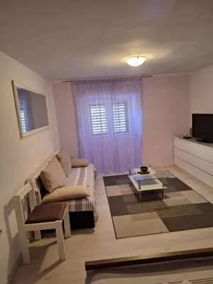 TV i/ili zabavni centar u objektu Apartments Duilo