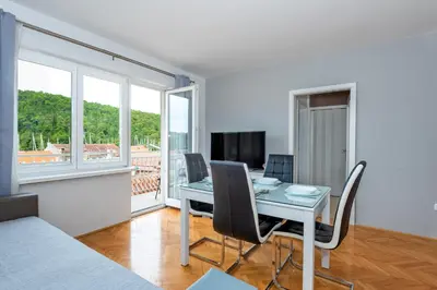 TV i/ili zabavni centar u objektu Apartments Duilo