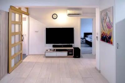 TV i/ili zabavni centar u objektu Apartment Bero, Central & free Parking