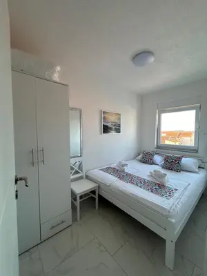 Krevet ili kreveti u jedinici u objektu Apartmani Aida