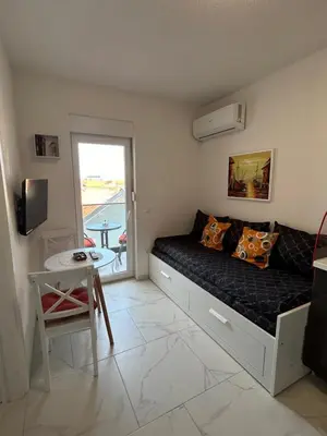 TV i/ili zabavni centar u objektu Apartmani Aida