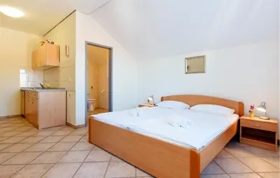 Krevet ili kreveti u jedinici u objektu Cozy Apartment In Jezera With Wifi