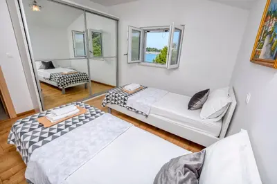 Krevet ili kreveti u jedinici u objektu Apartments Silvana