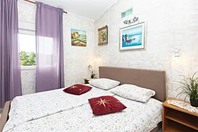 Krevet ili kreveti u jedinici u objektu Apartments by the sea Grebastica, Sibenik - 461