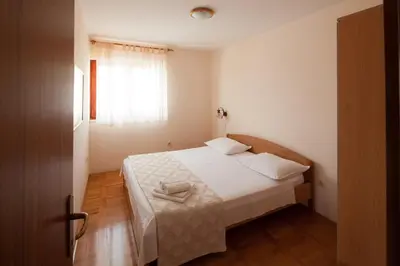Krevet ili kreveti u jedinici u objektu Apartments by the sea Bilo - Primosten - 4191