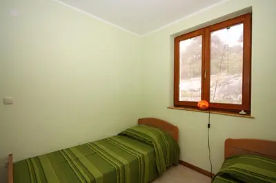 Krevet ili kreveti u jedinici u objektu Seaside holiday house Tisno, Murter - 5094