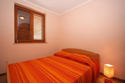 Krevet ili kreveti u jedinici u objektu Seaside holiday house Tisno, Murter - 5094