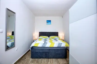 Krevet ili kreveti u jedinici u objektu Apartment Tisno 5130c