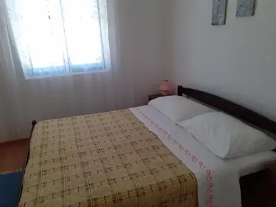 Krevet ili kreveti u jedinici u objektu Apartments by the sea Rogoznica - 7499