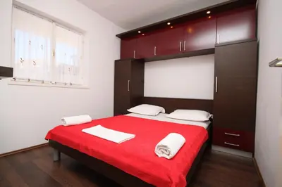 Krevet ili kreveti u jedinici u objektu Apartments by the sea Bilo, Primosten - 8364