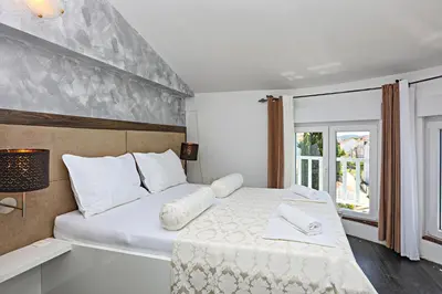 Krevet ili kreveti u jedinici u objektu Family-friendly apartments with swimming pool Zecevo Rtic, Rogoznica - 8366