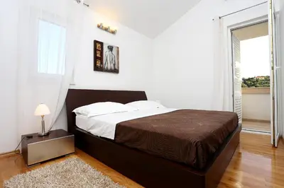 Krevet ili kreveti u jedinici u objektu Apartments by the sea Zecevo Rtic, Rogoznica - 10333