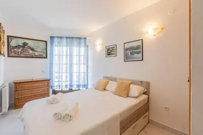 Krevet ili kreveti u jedinici u objektu Apartments by the sea Zecevo Rtic, Rogoznica - 10334