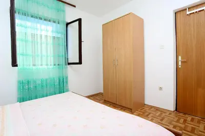 Krevet ili kreveti u jedinici u objektu Apartment Rogoznica 10338b