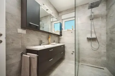 Kupaonica u objektu Villa Ocean Breeze - Meerblick - zwei Küchen