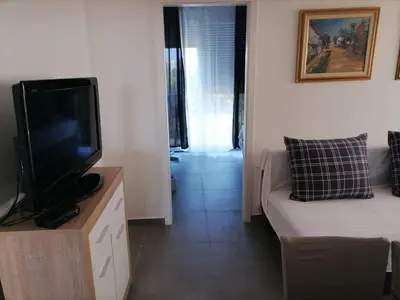 TV i/ili zabavni centar u objektu Apartments by the sea Jezera, Murter - 24139