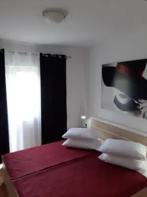 Krevet ili kreveti u jedinici u objektu Apartments Adria