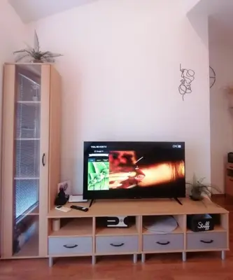 TV i/ili zabavni centar u objektu Marcello